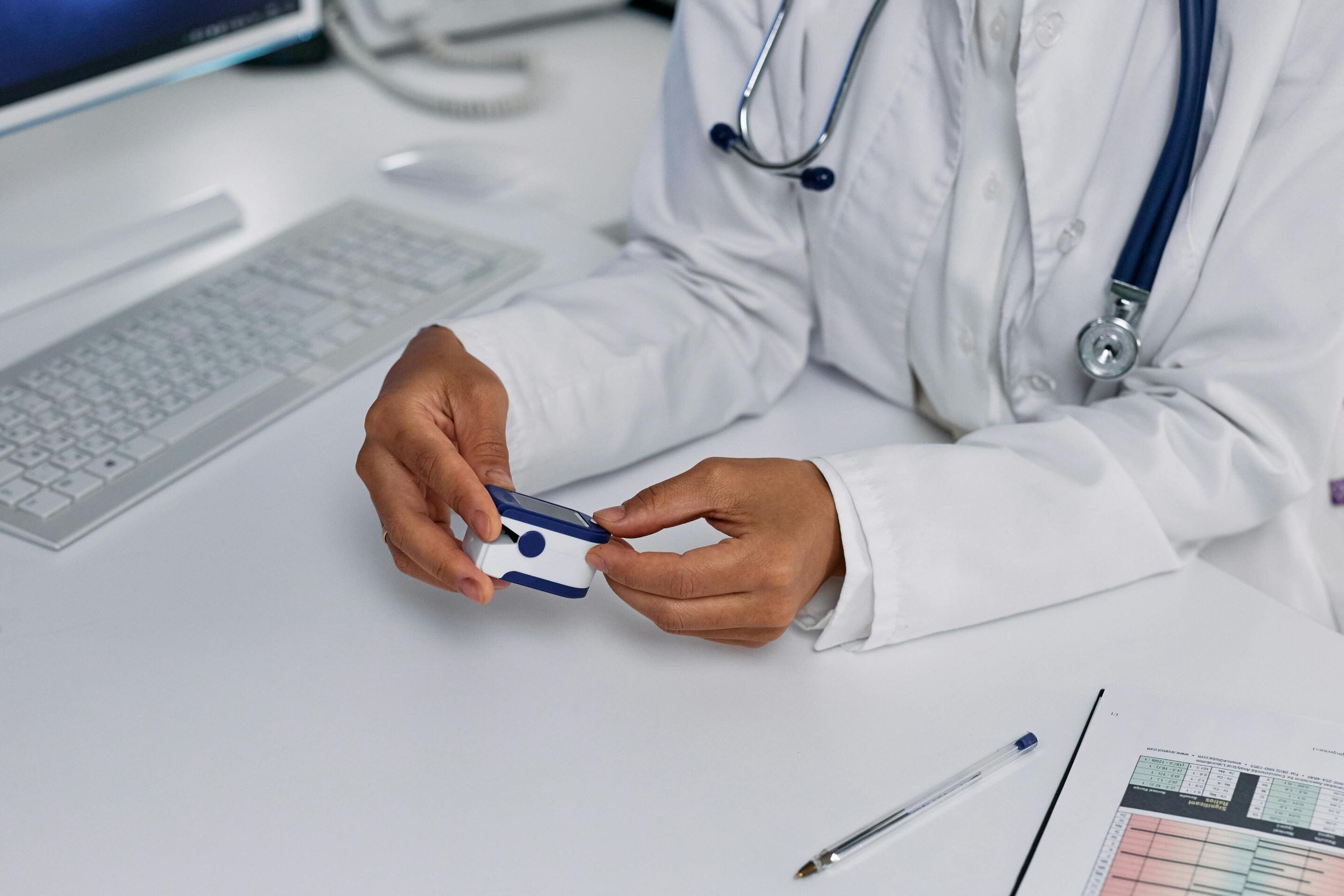 Seated doctor waiting for patient