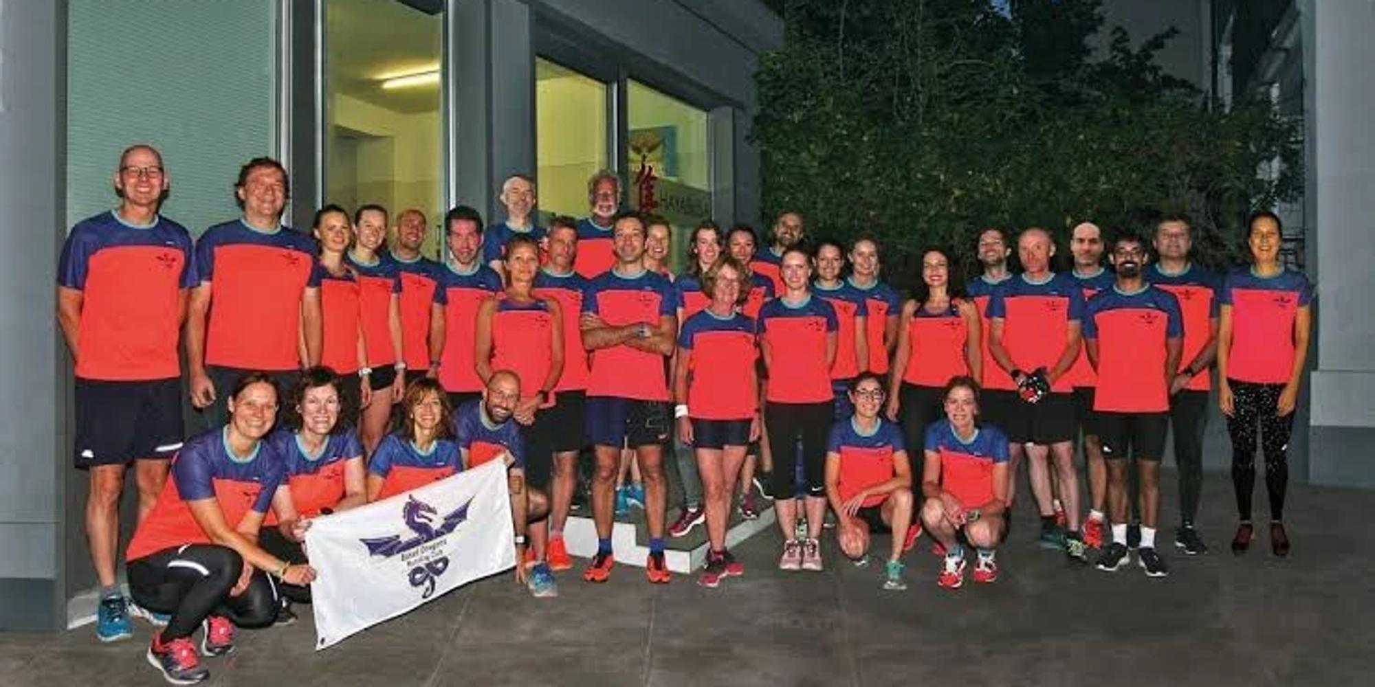 Basel Dragons members in club shirts outside the clubhouse