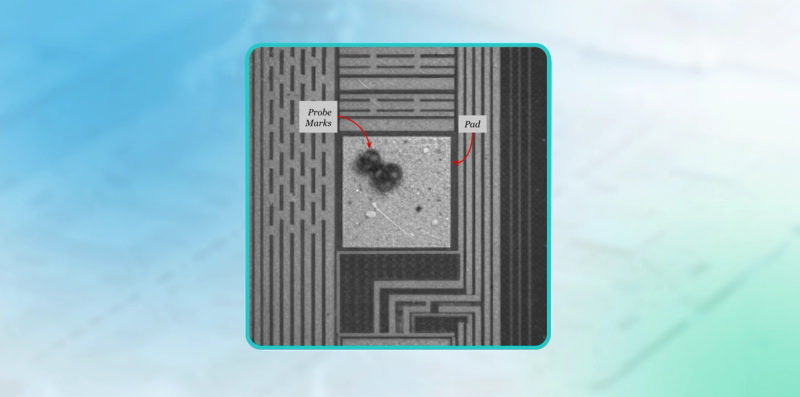 Microscope image of a wafer pad showing dark probe needle marks on the pad surface, annotated with labels “Pad” and “Probe Marks,” illustrating probe touchdown location.