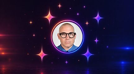 A headshot of Nick Foster framed in a glowing circular border against a starry purple background.