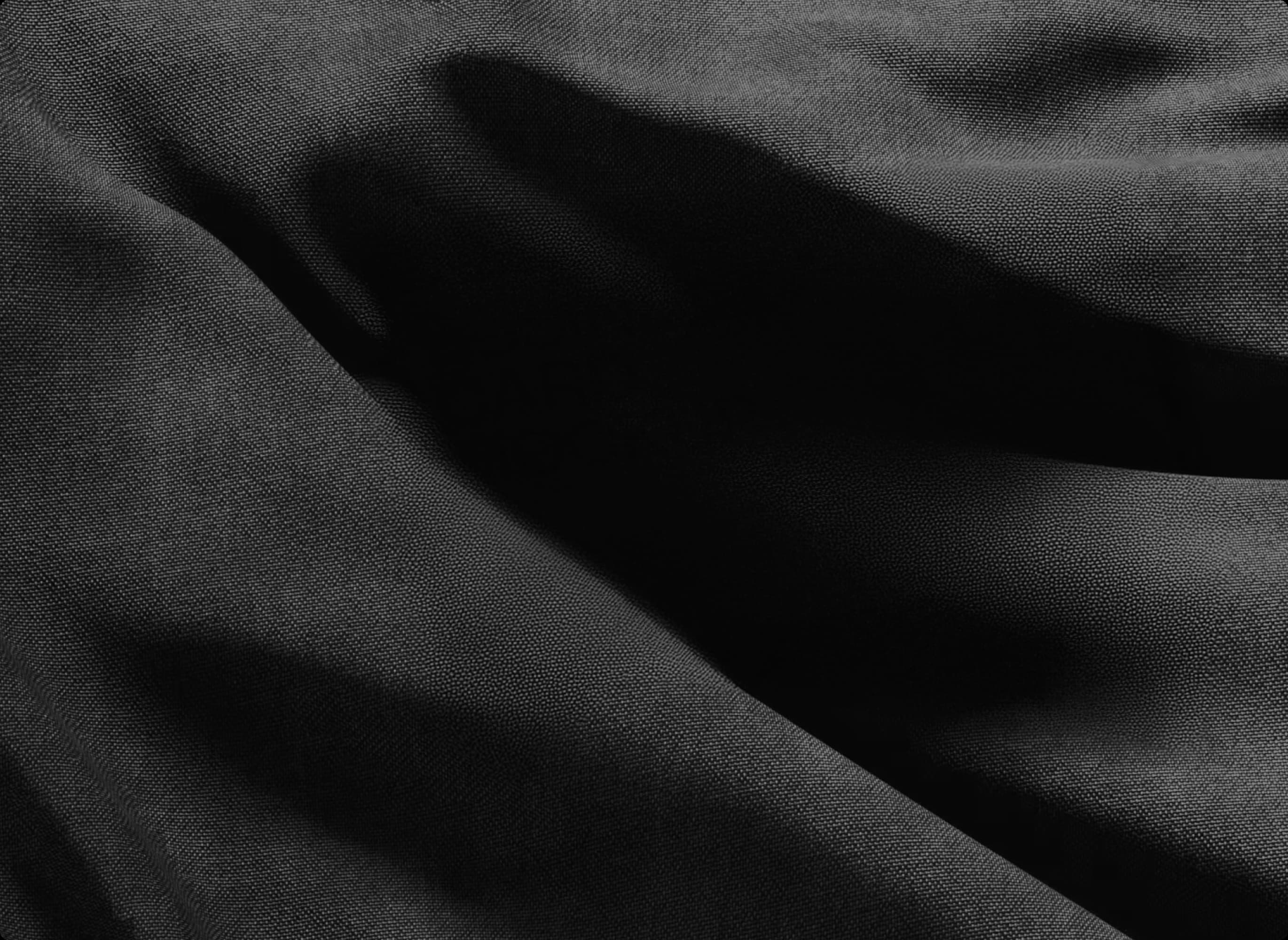 Textured dark grey and black backdrop