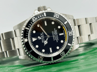Rolex ROLEX SUBMARINER NO DATE 14060M NEW OF OLD STOCK FULL STICKERS SEPTEMBER 2011 foto 8