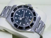 Rolex ROLEX SUBMARINER NO DATE 14060M NEW OF OLD STOCK FULL STICKERS SEPTEMBER 2011 foto 1