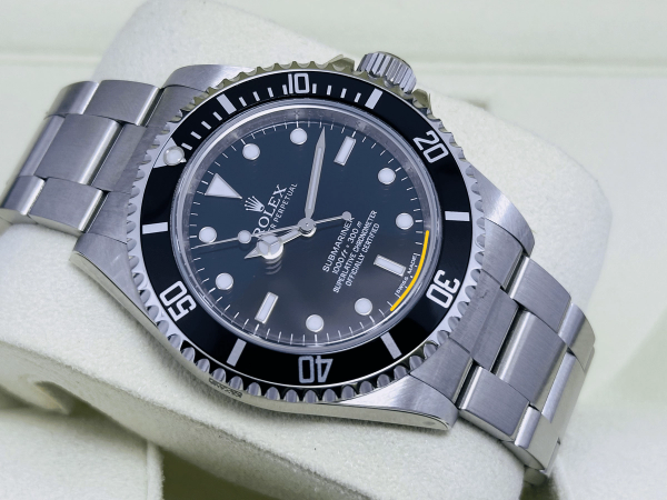 Rolex ROLEX SUBMARINER NO DATE 14060M NEW OF OLD STOCK FULL STICKERS SEPTEMBER 2011 foto 1