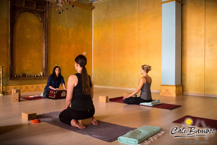 Yoga Class In A Beautiful Hall Made Of Bamboo by Stocksy Contributor  Mosuno - Stocksy