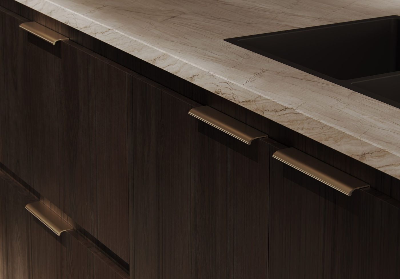 Detail of dark-stained timber cabinetry with slim bronze edge pulls beneath a pale veined stone benchtop and matte black undermount sink