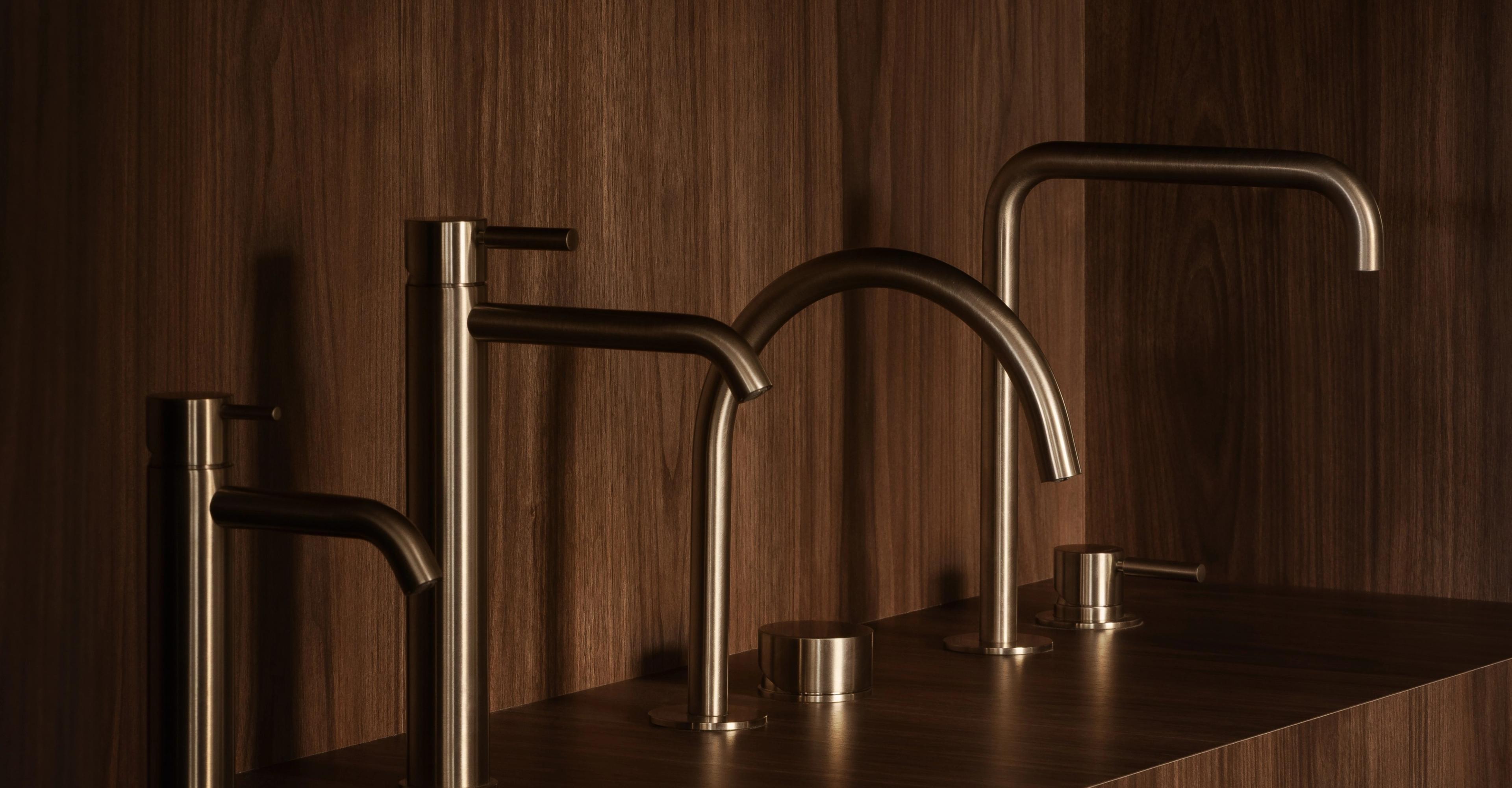 Range of tapware finishes on timber vanity