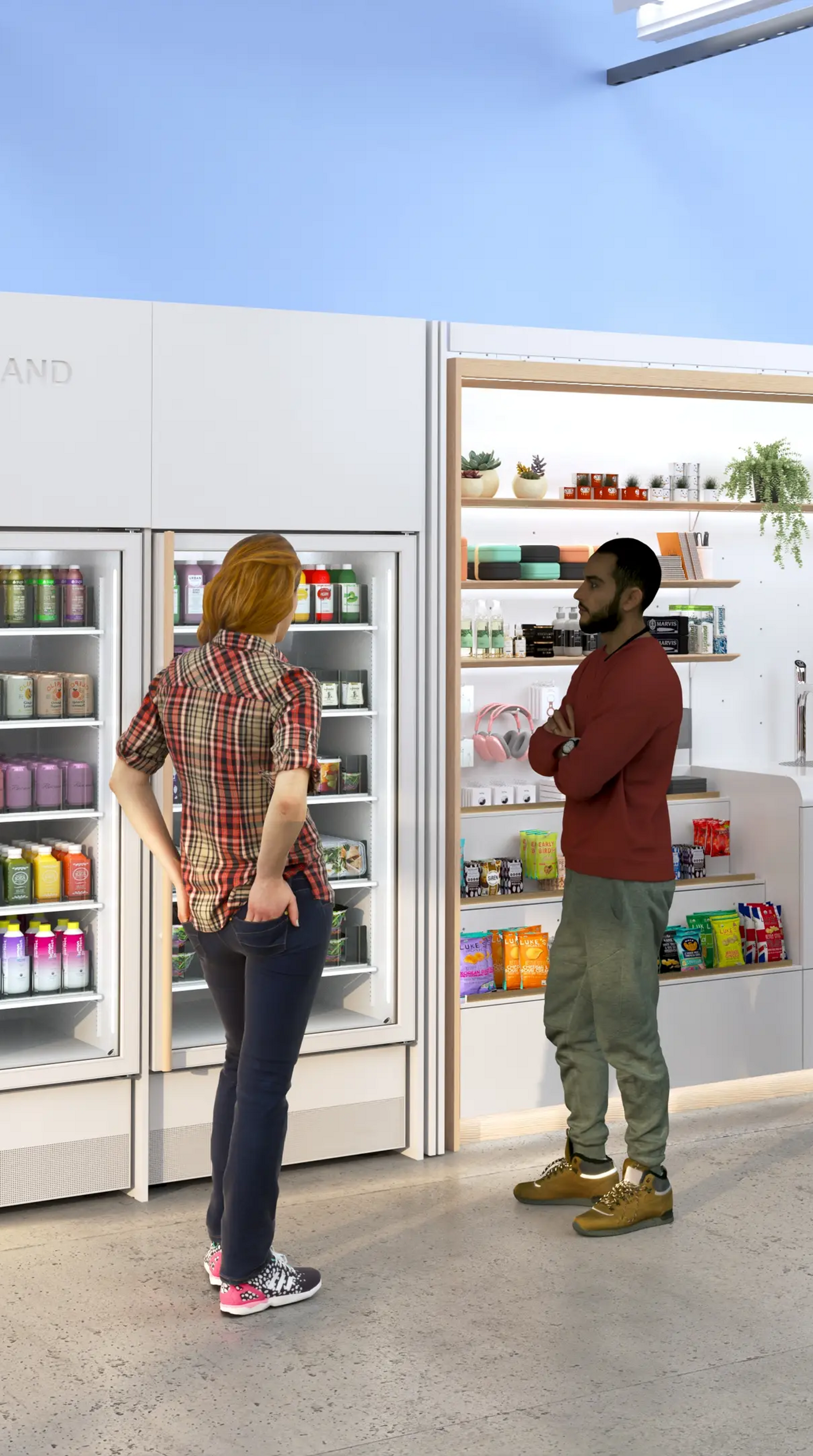 Employees gathering around New Stand display case