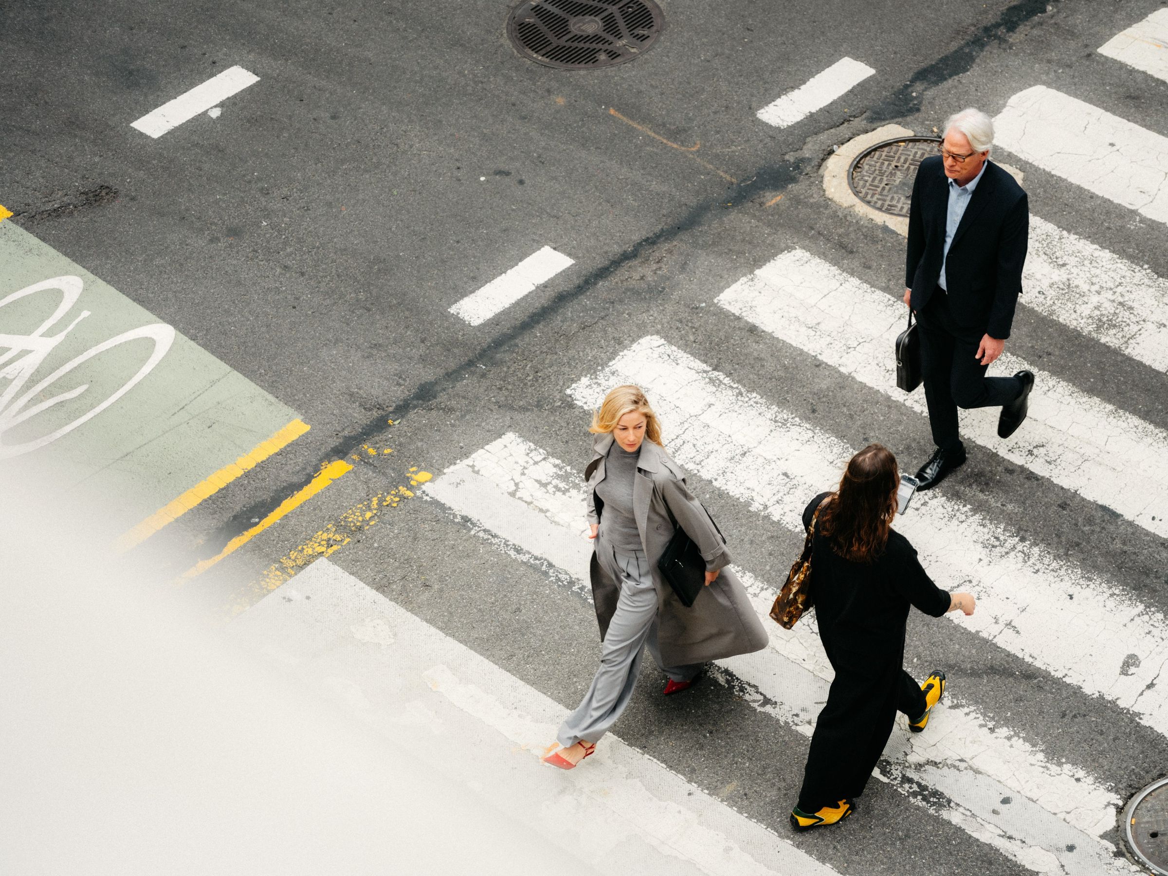 Lawyers crossing a city street