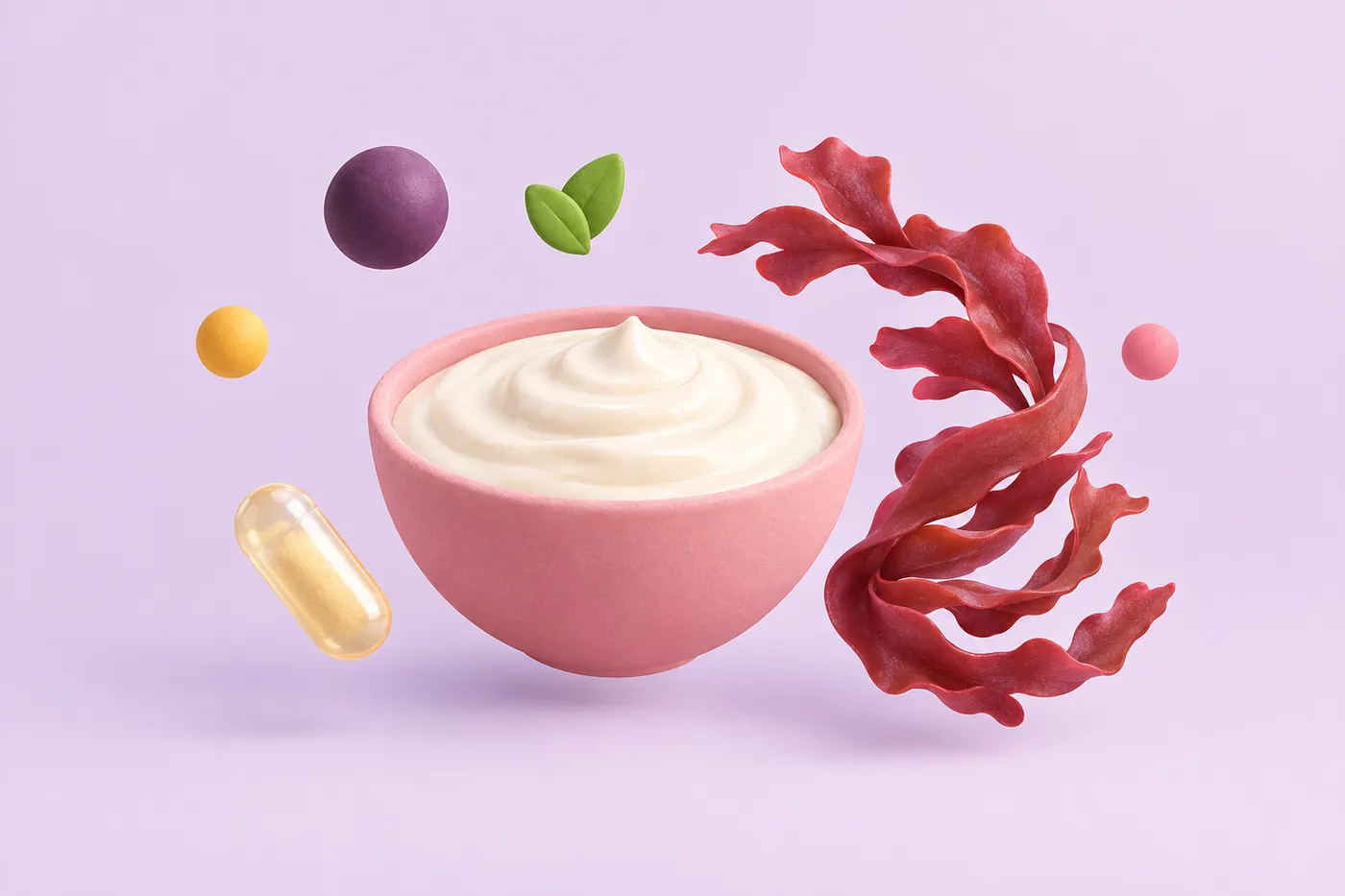 A bowl of plant-based yogurt beside a strand of red seaweed and a stabilizer capsule