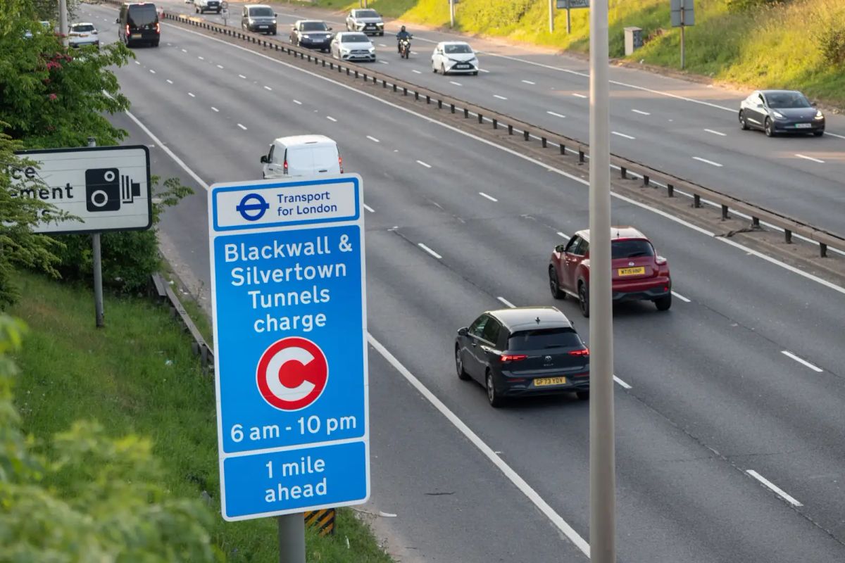 Silvertown and Blackwall tunnels with AutoChain branding showing modern tunnel infrastructure and charging system