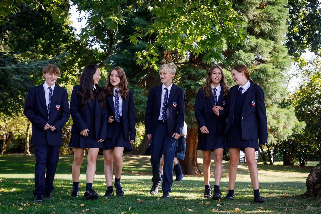 A group of students outdoors in school uniform 