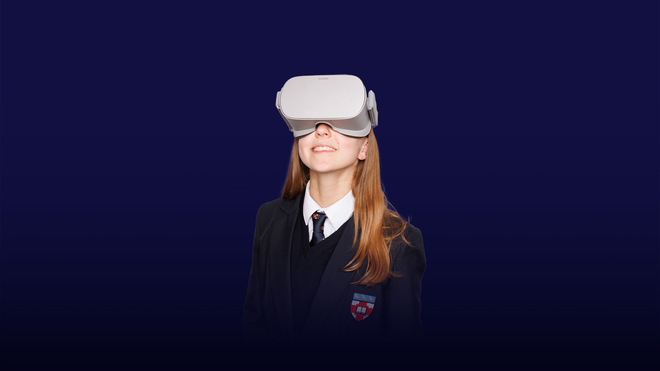 Image of a girl wearing a VR Headset with an overlay of the text "inspiring minds"