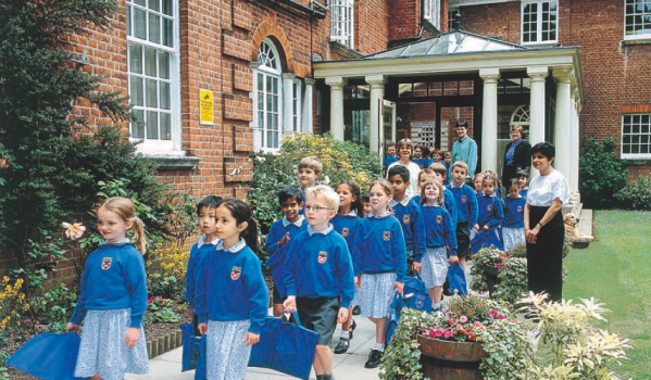 Old picture of young children outside the school Grimsdell, Mill Hill Pre Prep