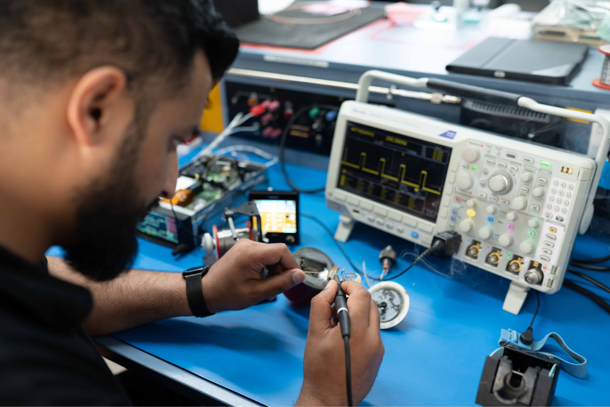 engineer working on avionic equipment