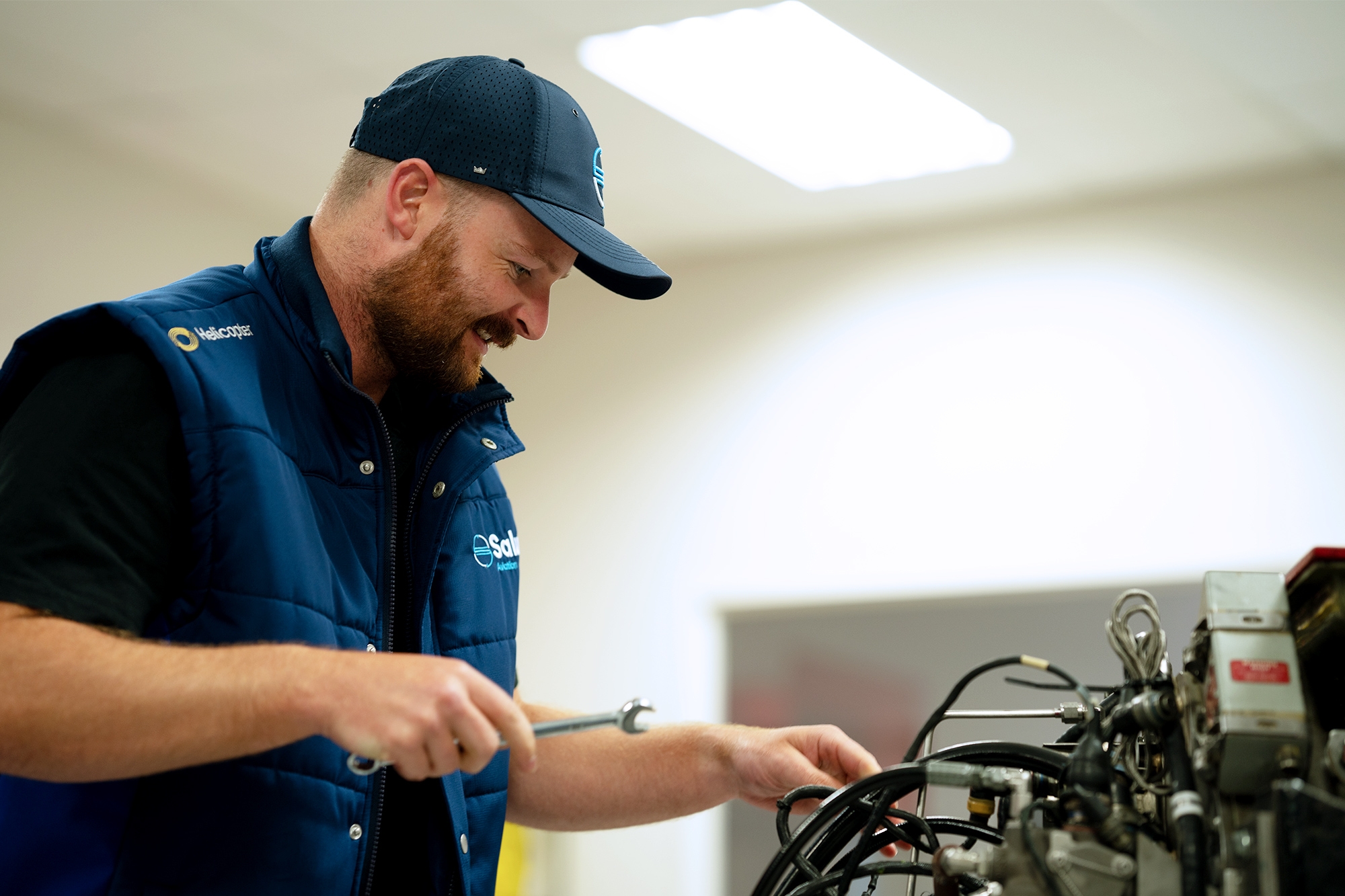 engineer working on LTS101 turbine engine