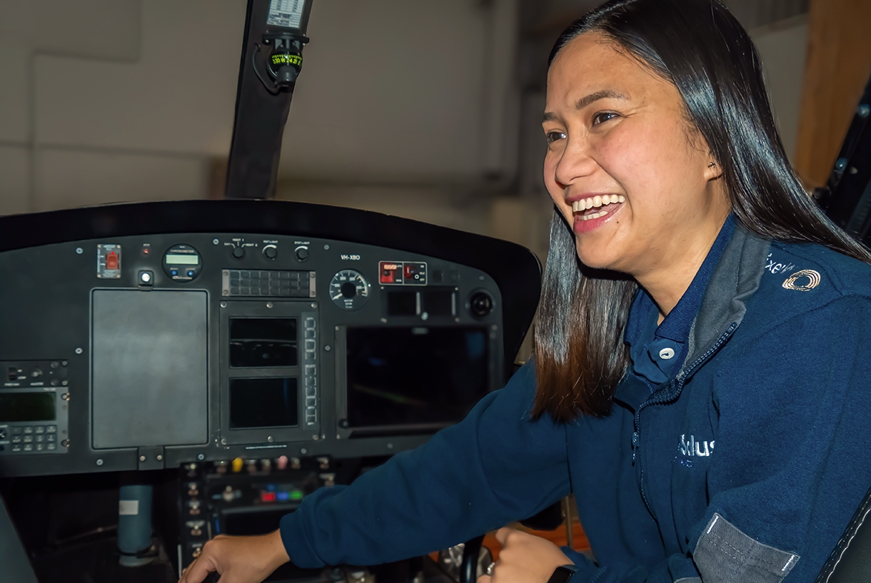 Freda in a helicopter working on Avionics