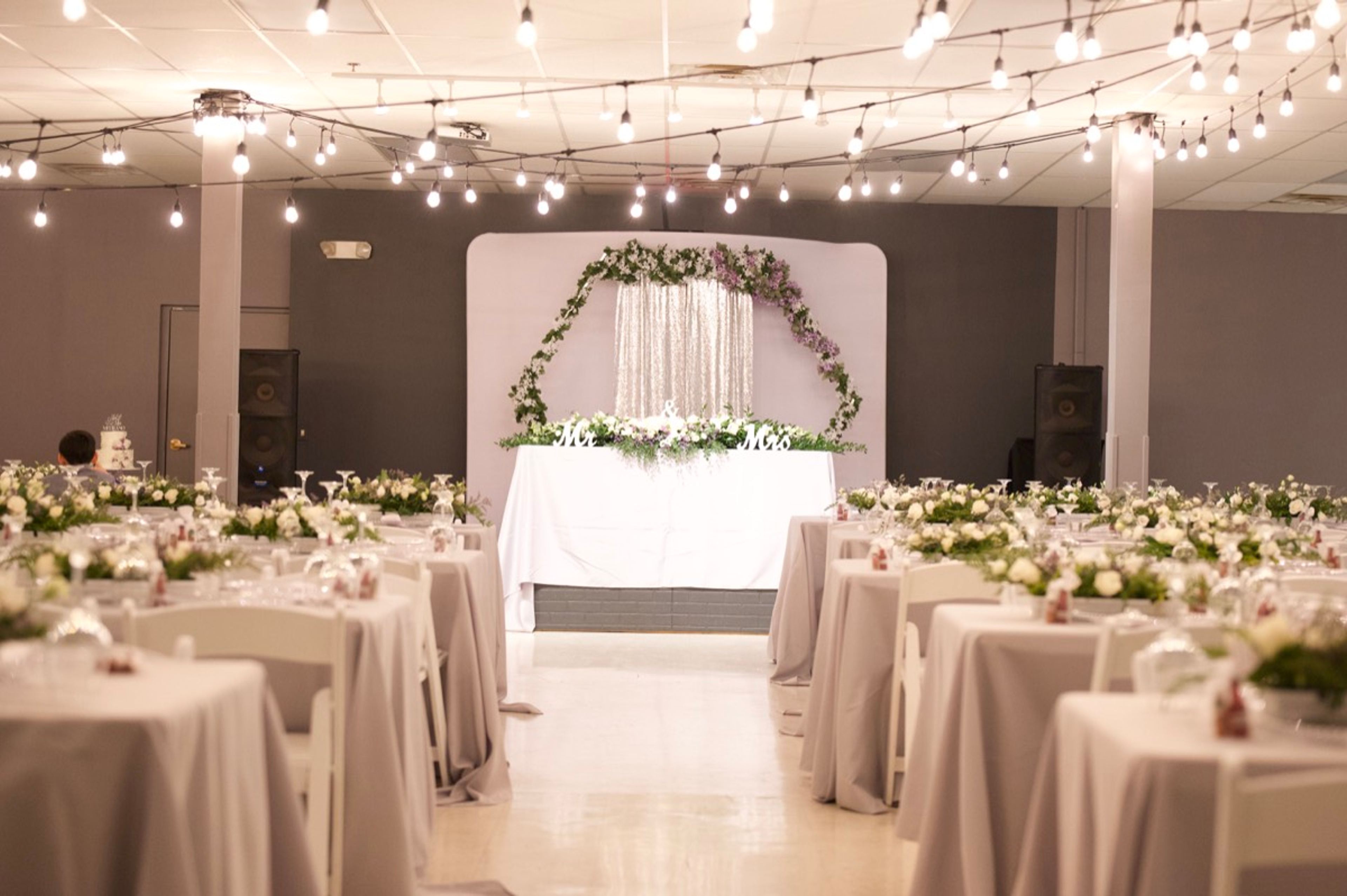 Floral head table at the Medrano Flores wedding