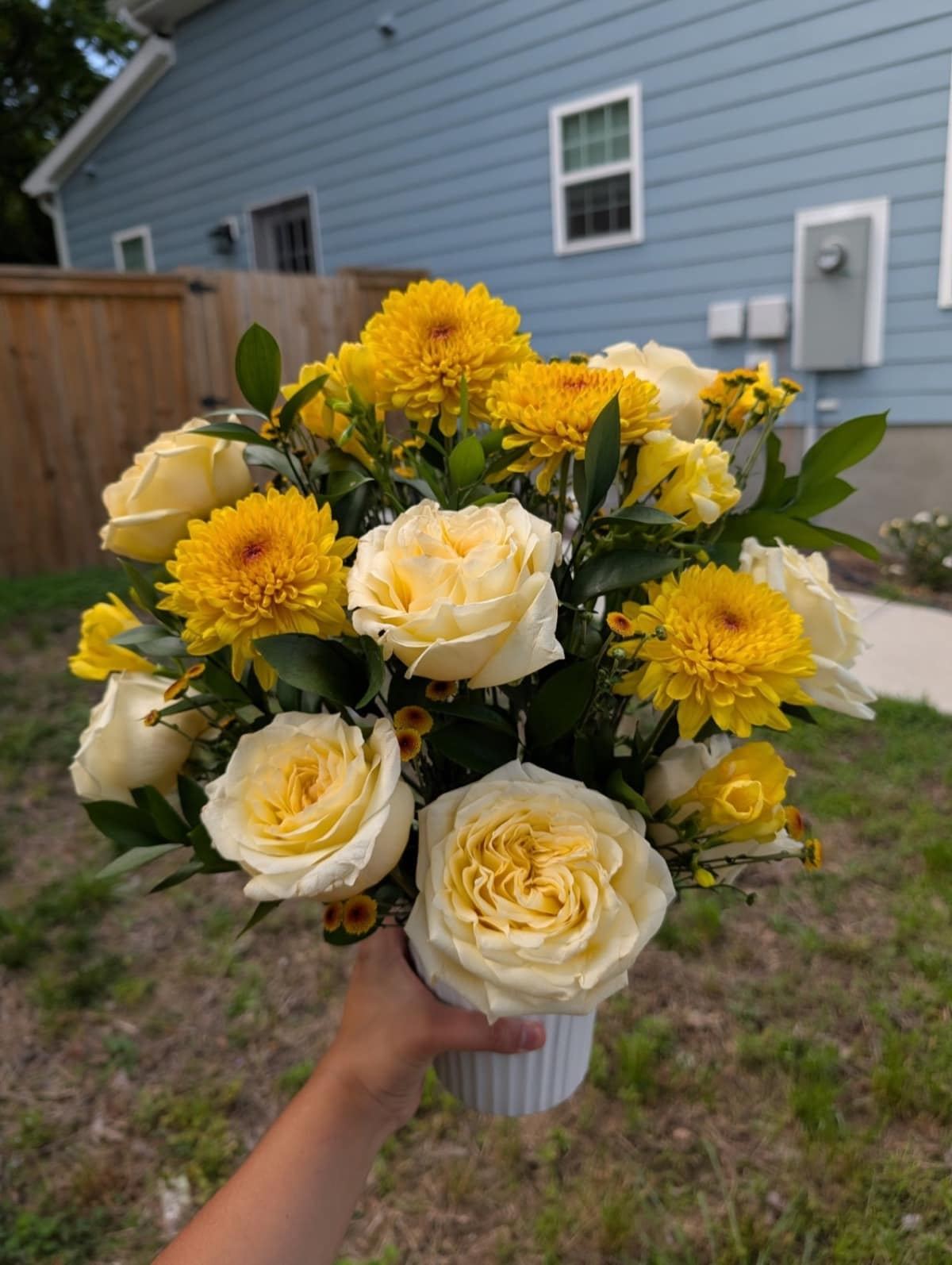 Bright custom bouquet with yellow and white flowers