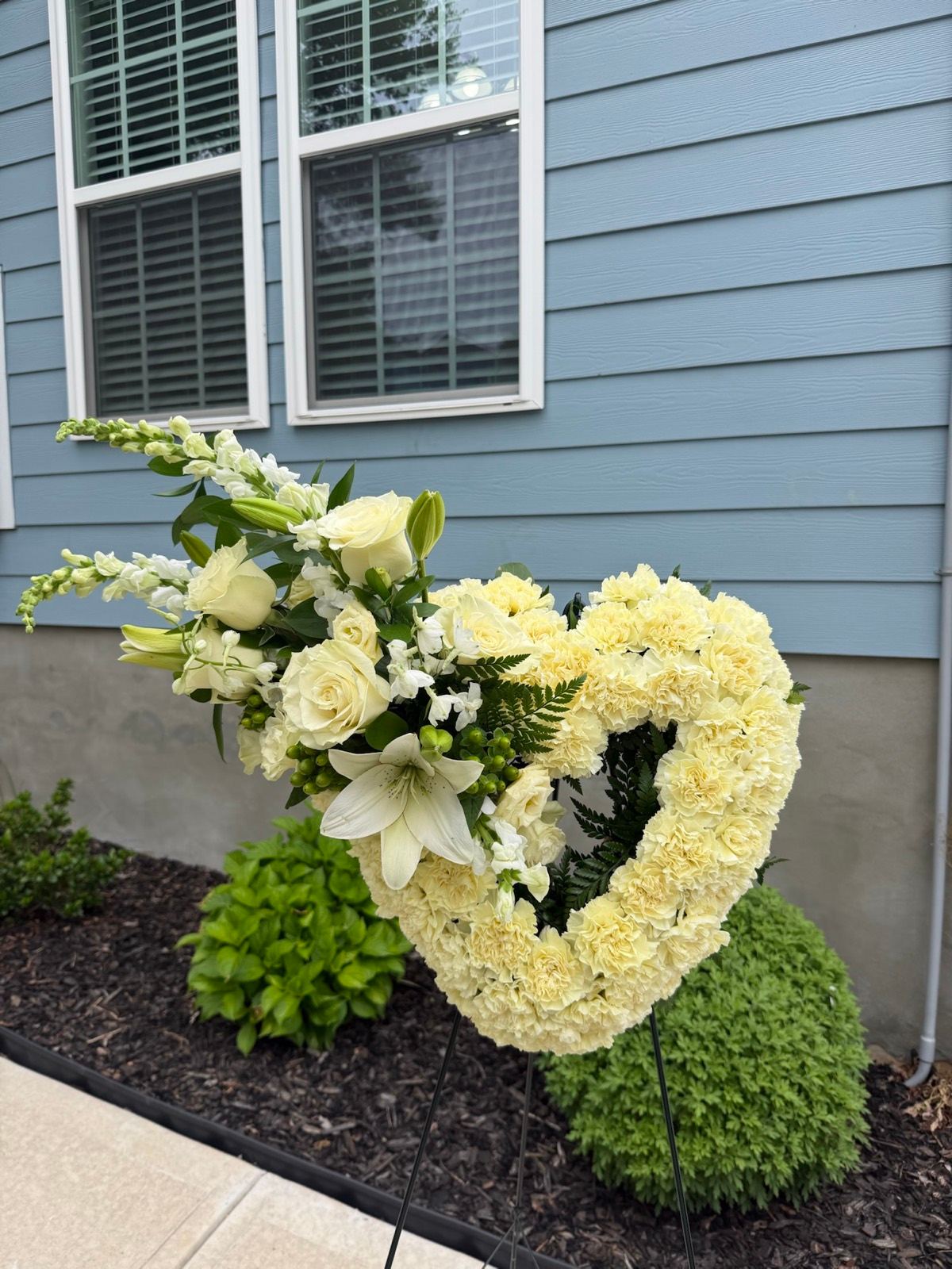 Compassionate floral tribute for a private memorial service