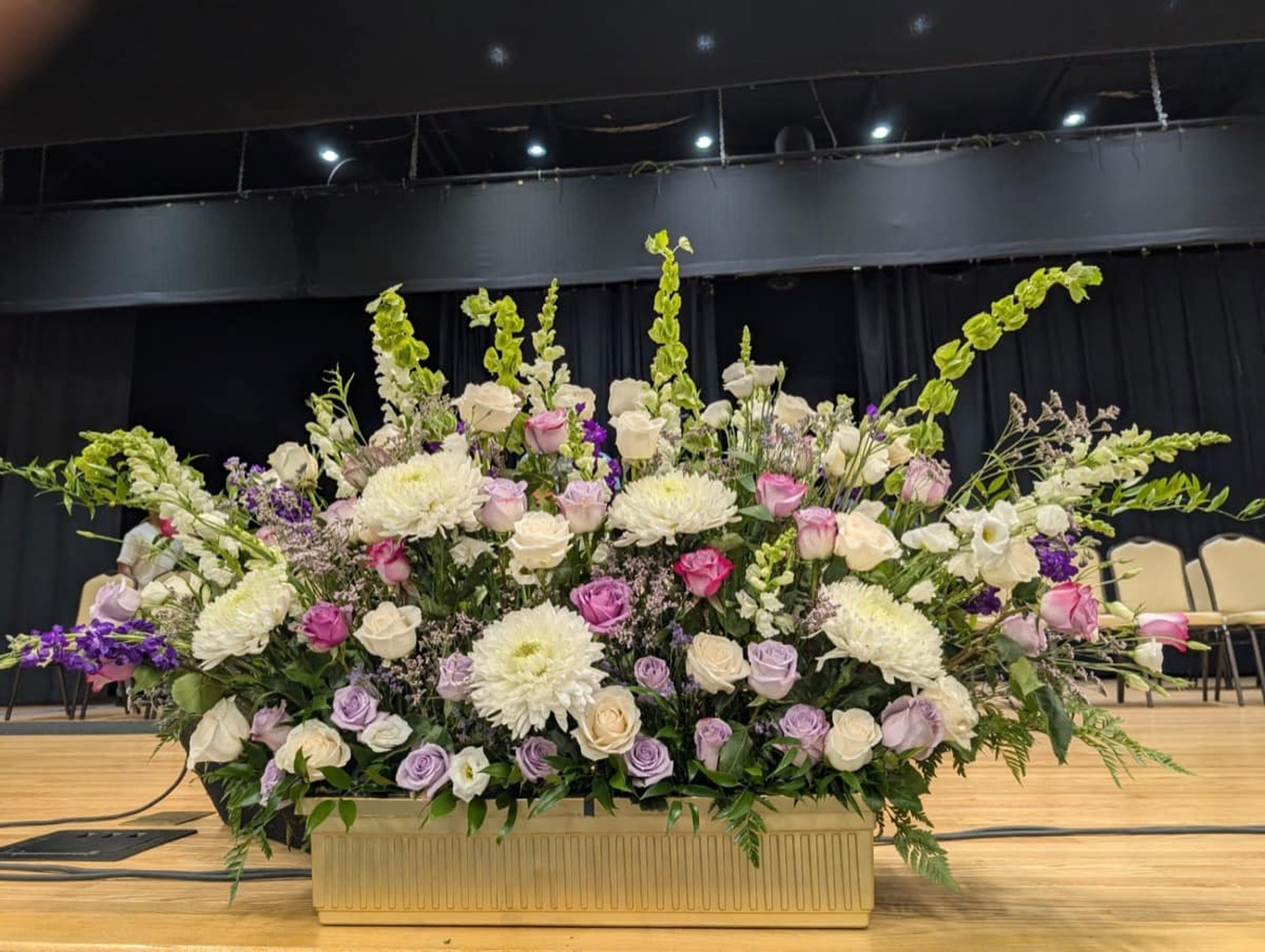 Stage florals for a community celebration