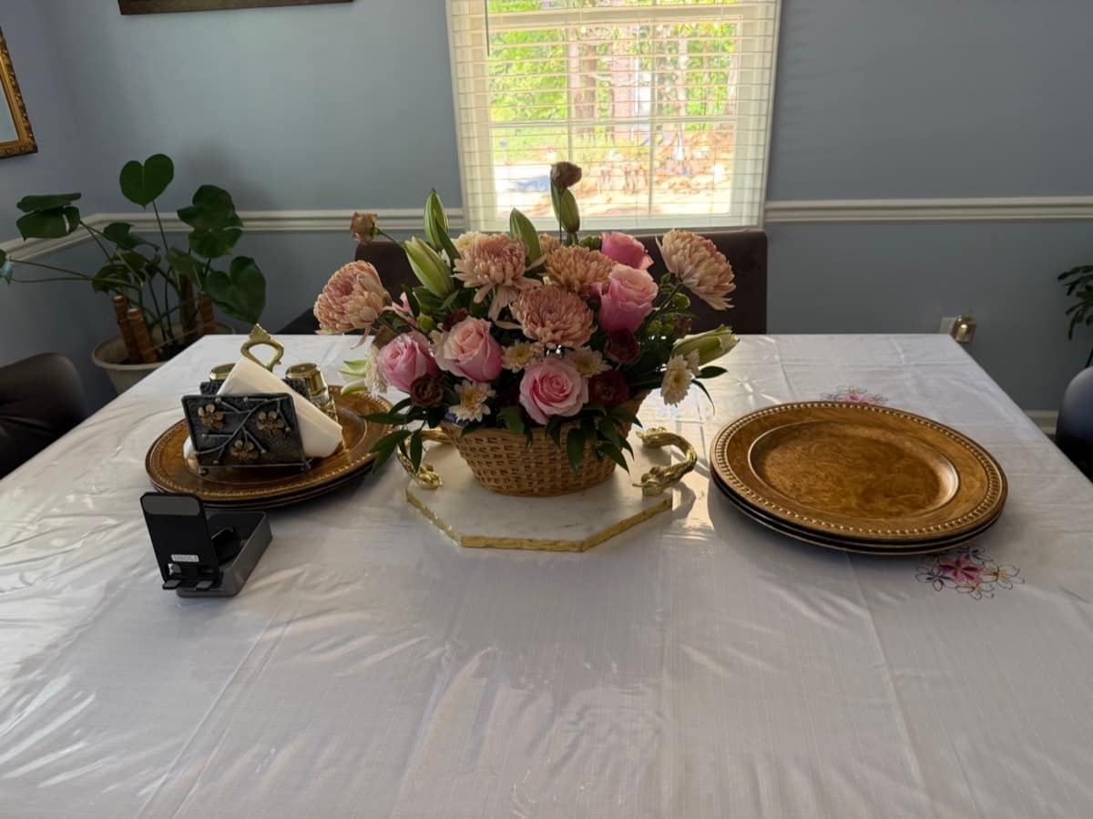 Pink floral gift basket prepared for a real-estate client