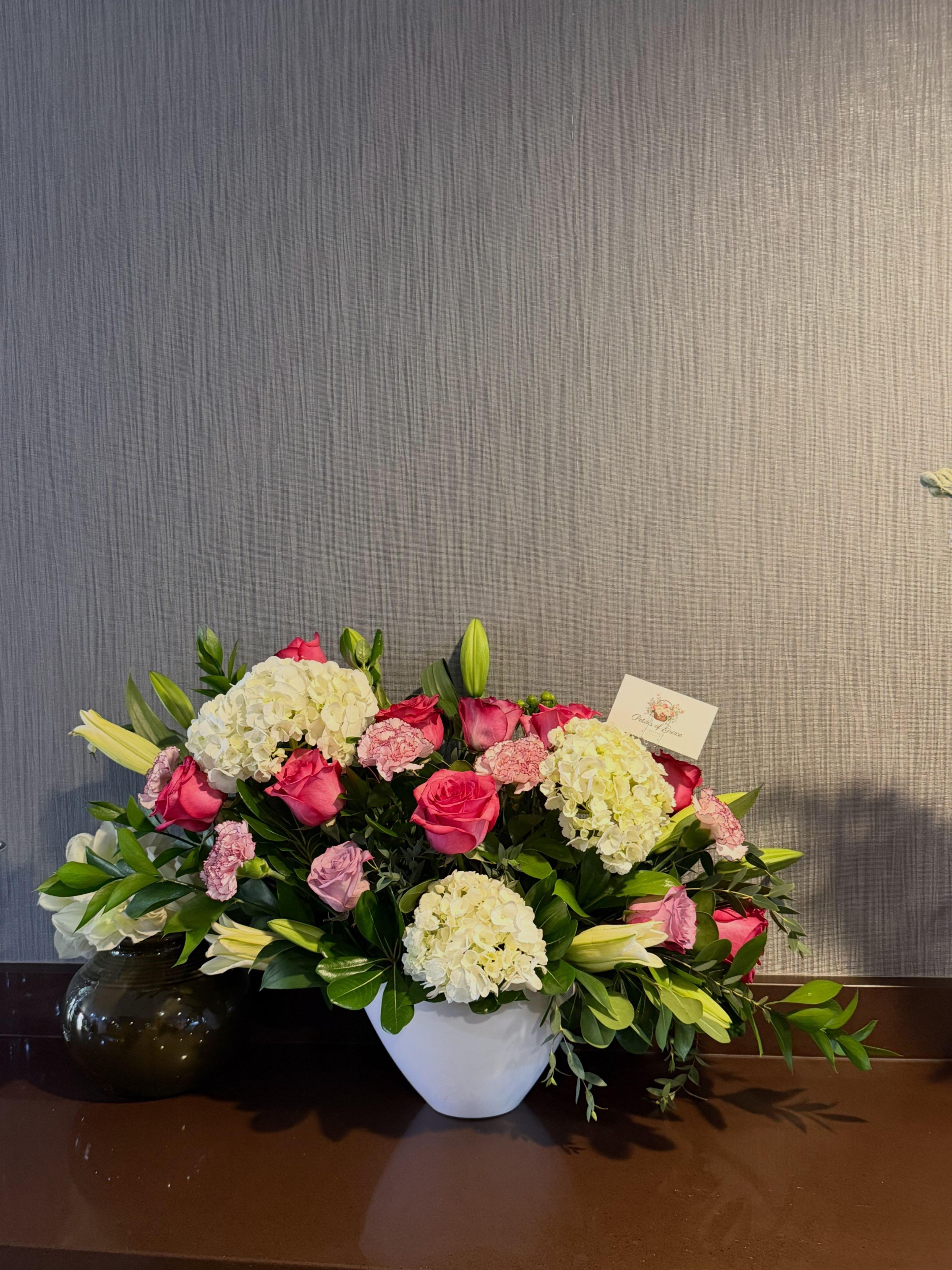 Hydrangeas, roses, and lilies