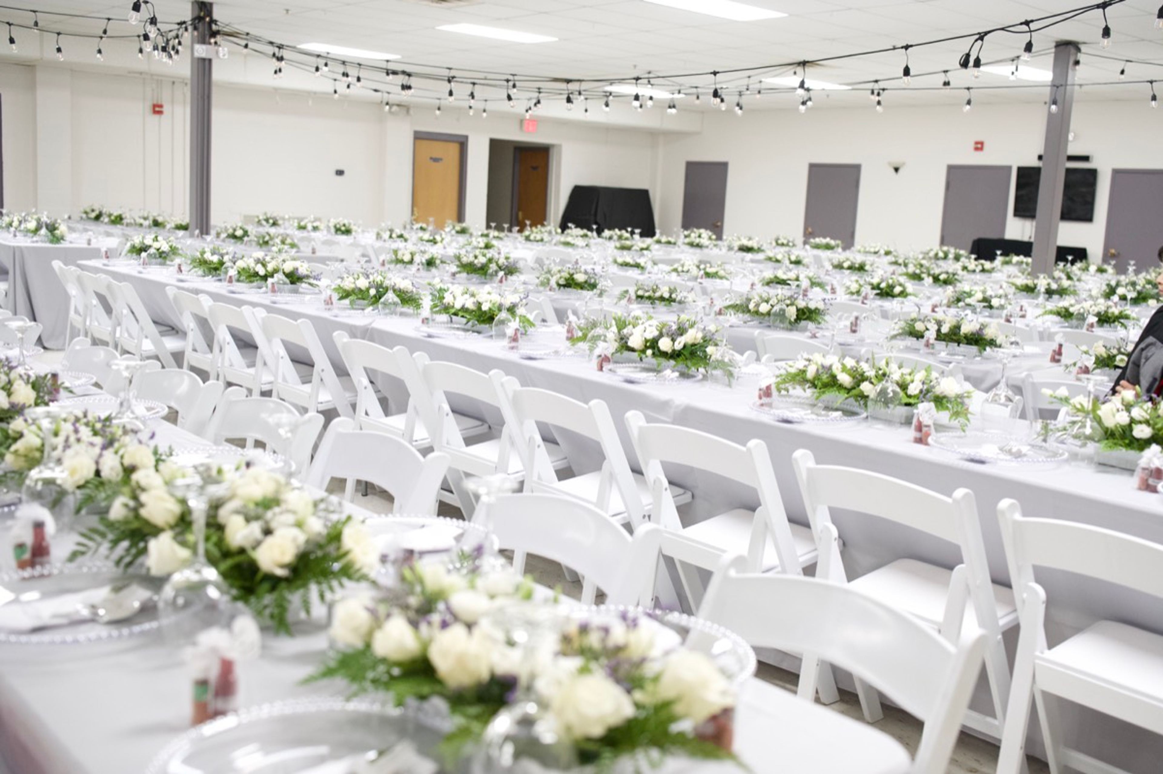 Medrano Flores wedding reception room with floral tablescapes