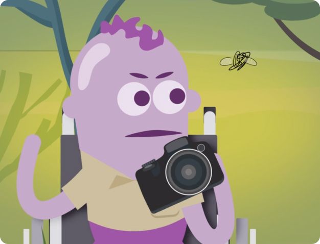 A cartoon character in a wheelchair holding a camera and looking annoyed at bug flying past