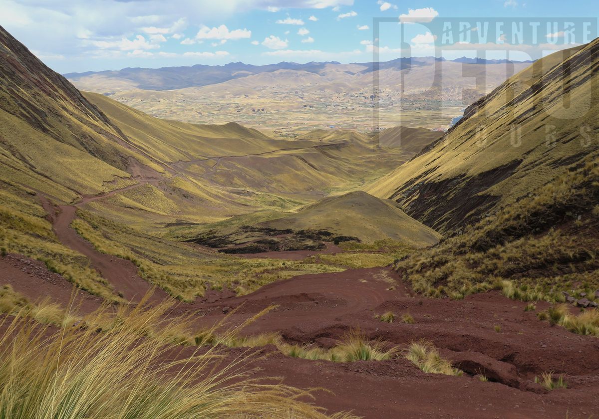 Red valley at Pallay Puncho Rainbow Mountain, in languilayo.