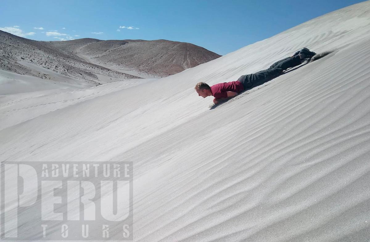 Sandboard free style on the dunes of Arequipa.