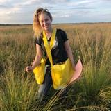 Photograph of author in prairie field