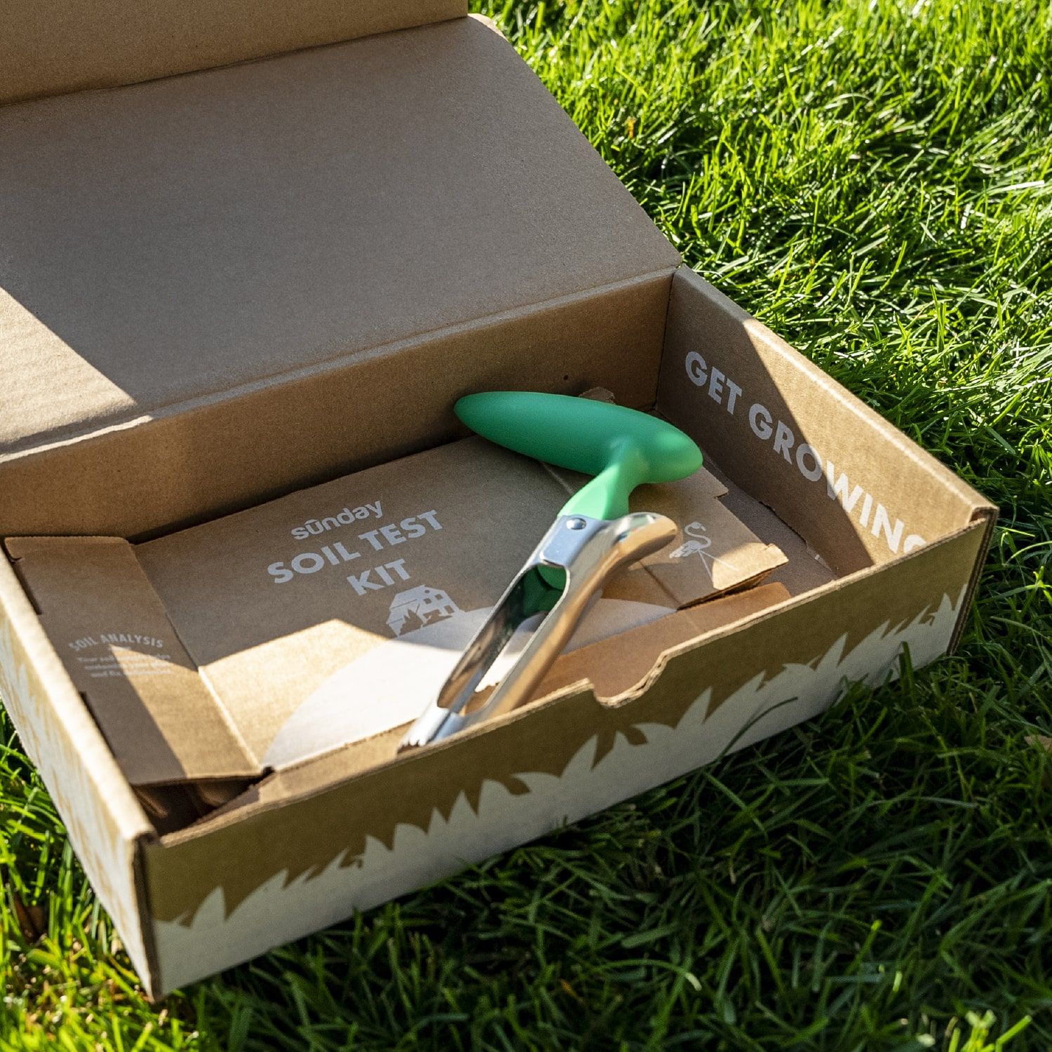 Sunday soil test kit on lawn