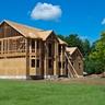 A new house being built, with grass around it