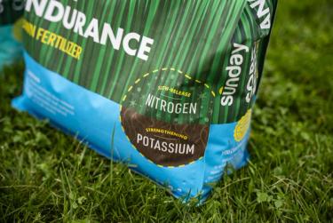 sunday granular lawn fertilizer on lawn