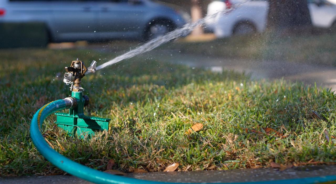 Sprinkler watering lawn incorrectly