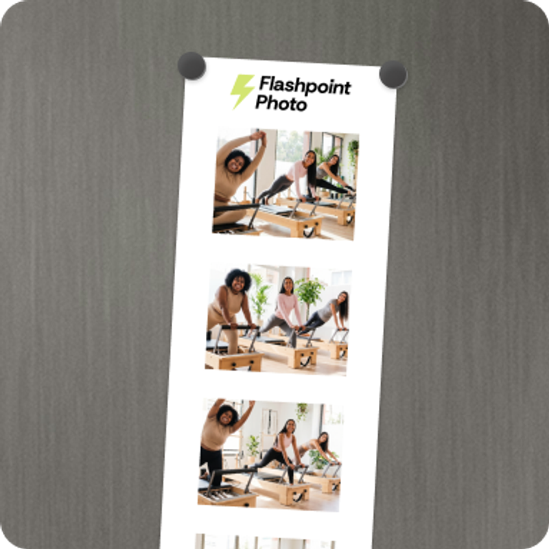 A printout of a photo booth capture - it is placed on the fridge.