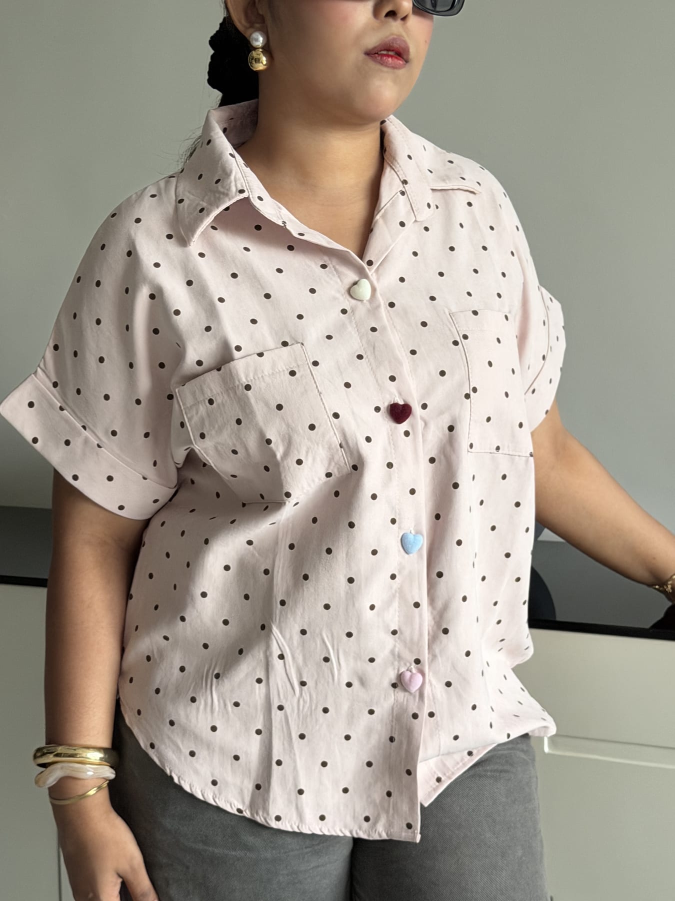 Pink polka-dot shirt