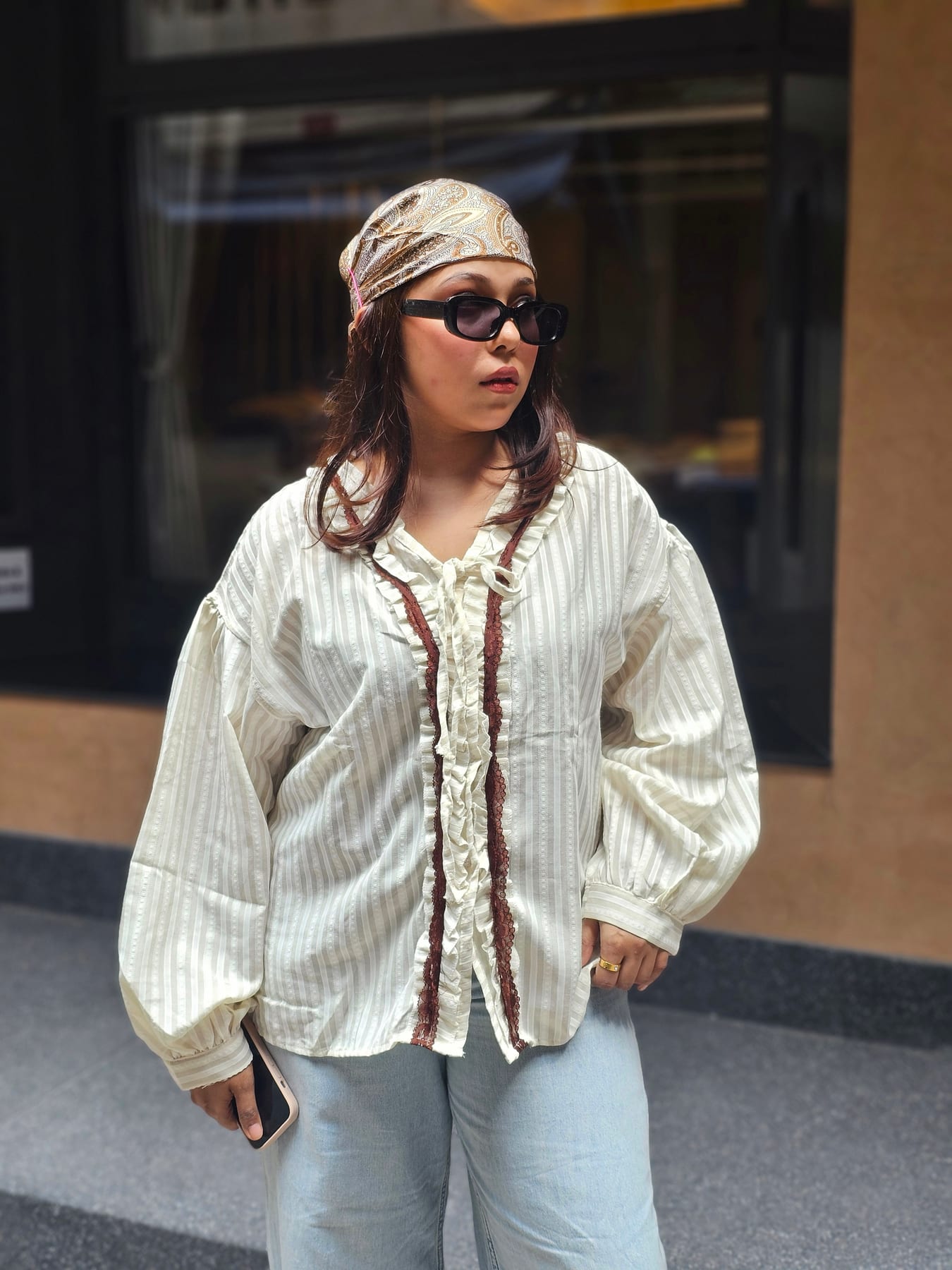 Cream striped ruffle-placket shirt