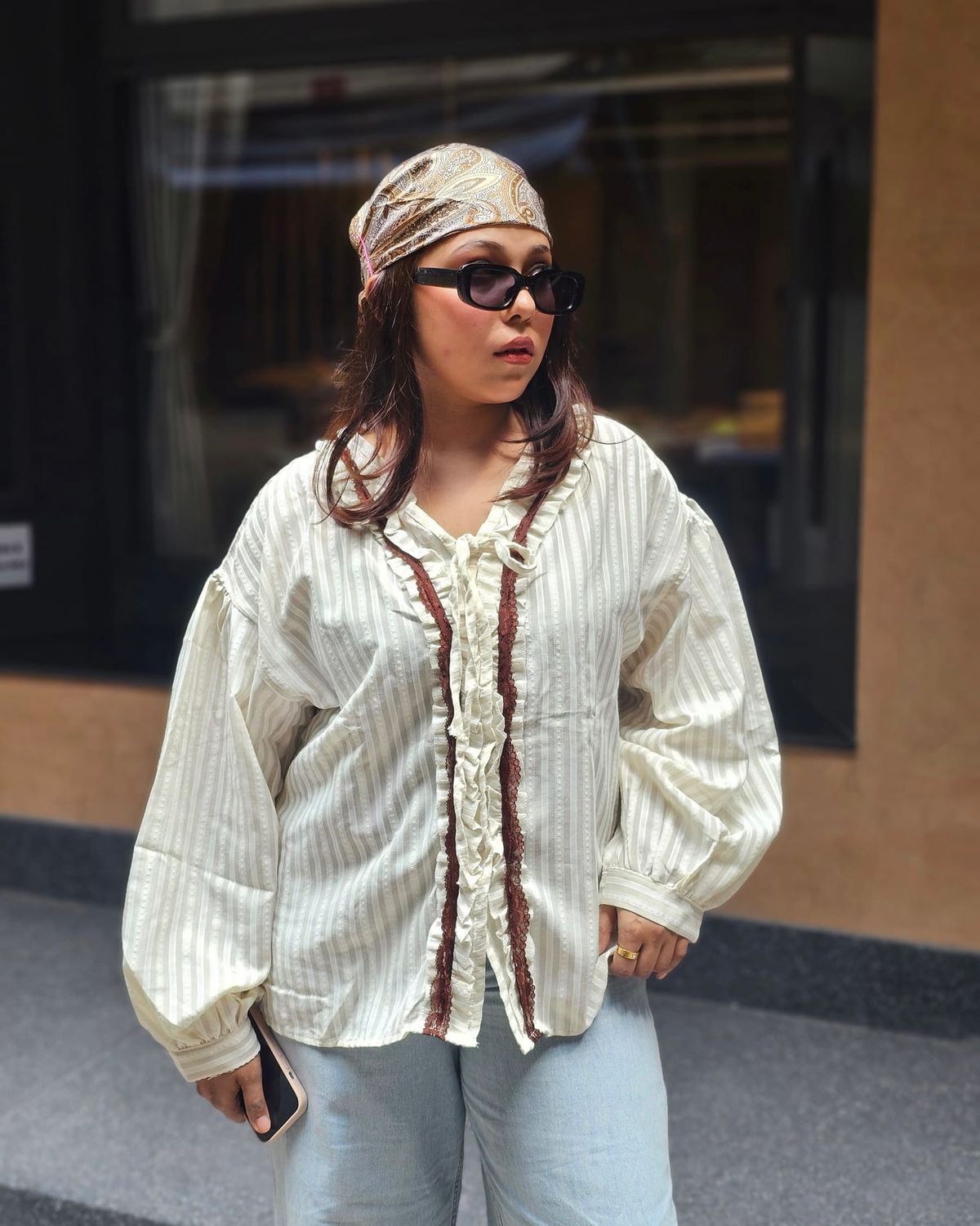 Cream striped ruffle-placket shirt
