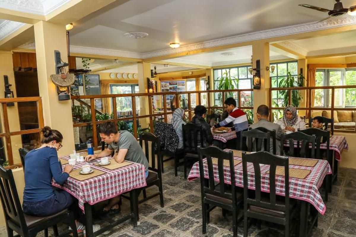 Guests at breakfast in the dining room
