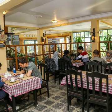 Guests at breakfast in the dining room