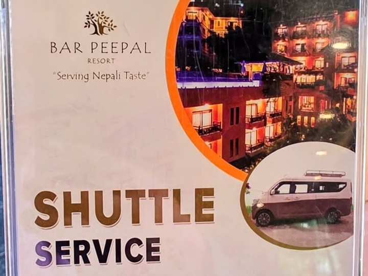 The shuttle card on the desk, with the resort’s van