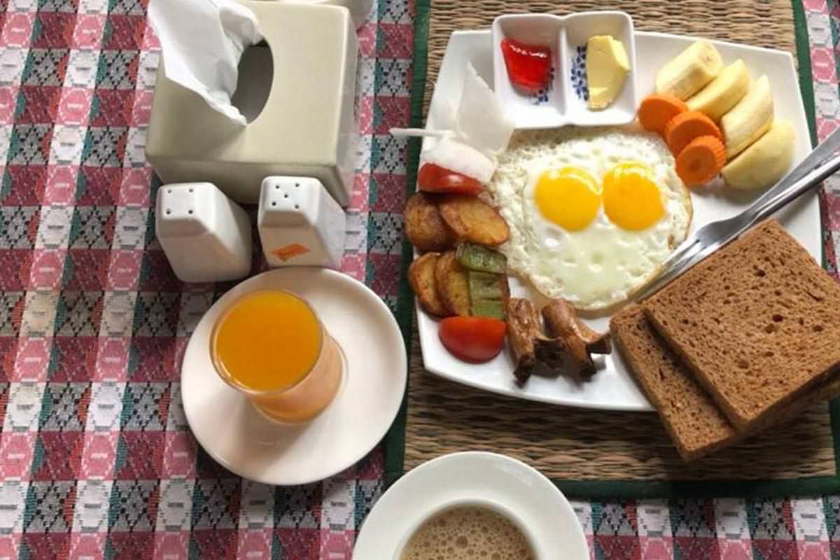 Breakfast: eggs, toast, fruit and juice
