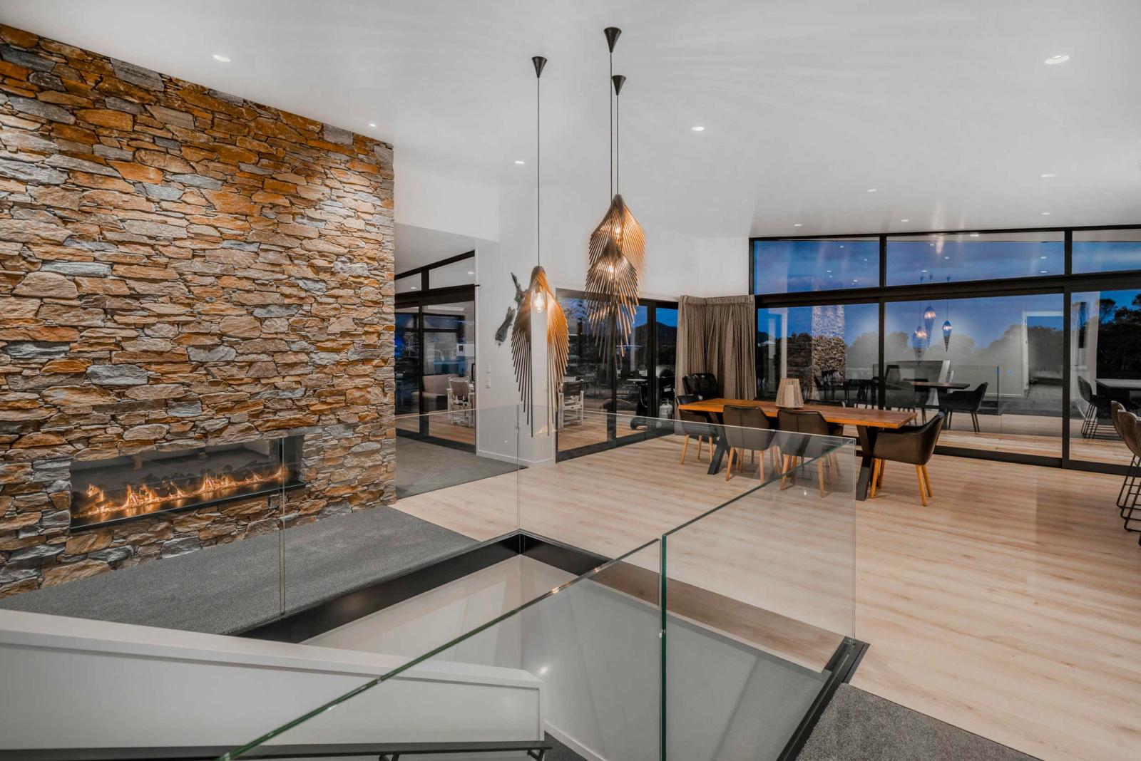 Living space with full-height joinery in a completed Ohlson + Whitelaw home