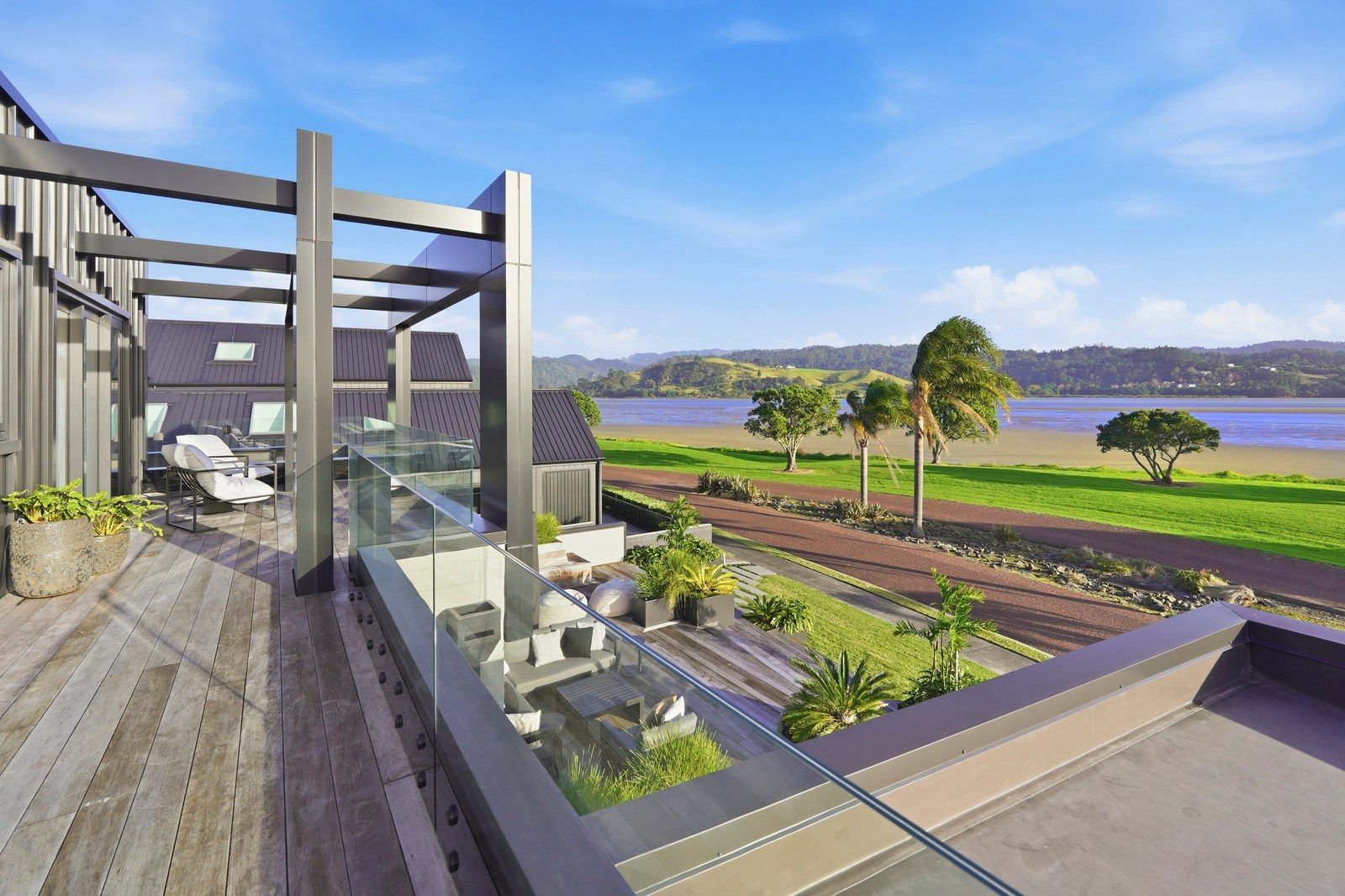 Terrace and outdoor living of a Pauanui waterfront home