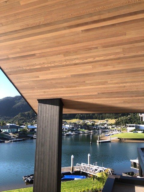 Pauanui — cedar soffit and the canal
