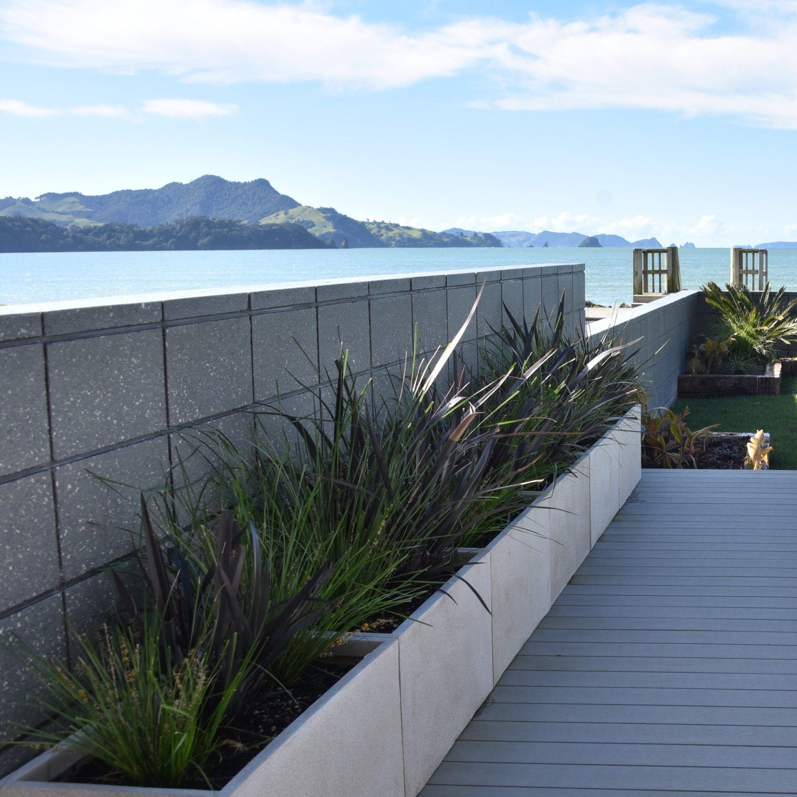 Buffalo Beach — planted terrace and the view across the bay
