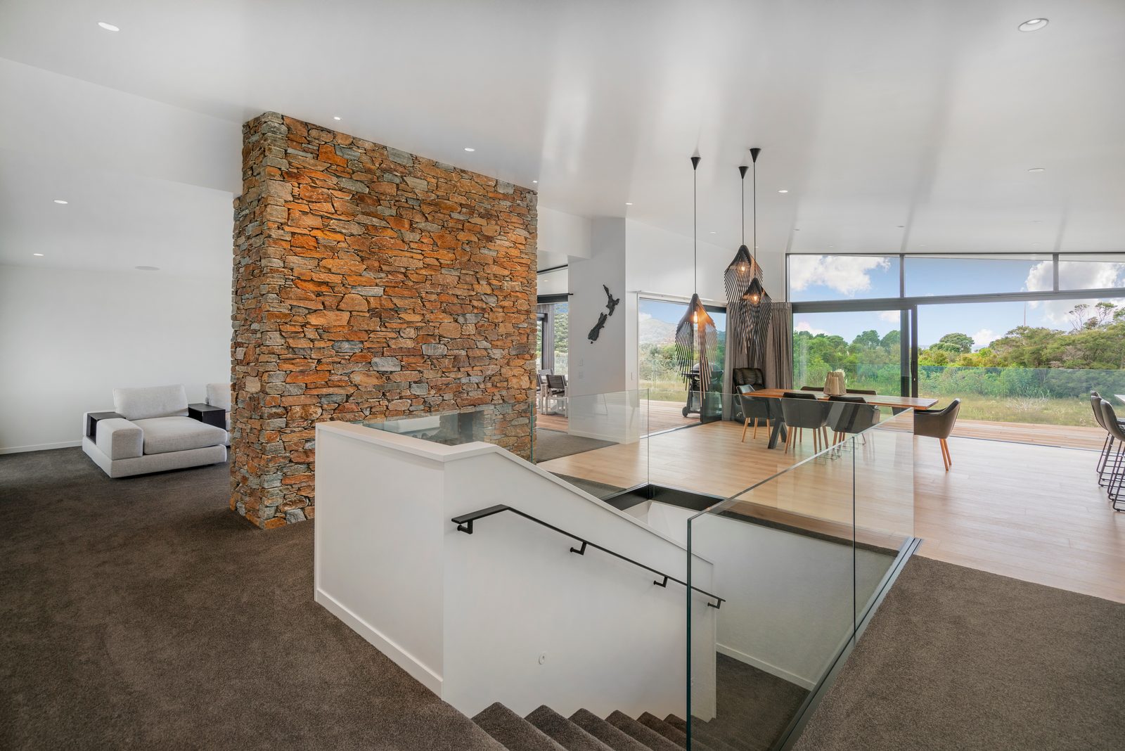 Cook Drive, Whitianga — stone chimney and stair