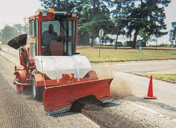 Broce-MK1-sweeping-and-loading-road-construction